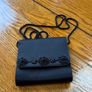 Talbots brand black evening bag with magnetic closure.  Beaded details.